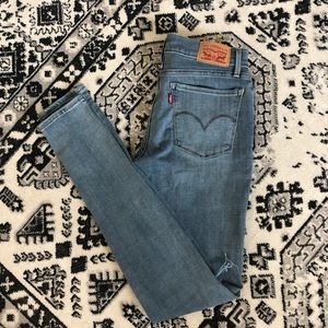Levi’s 710 Super Skinny Jeans with Knee Rips